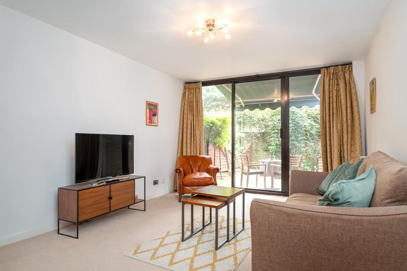 شقة Guestready - Lovely Ground Floor Duplex With Patio In Southbank لندن المظهر الخارجي الصورة